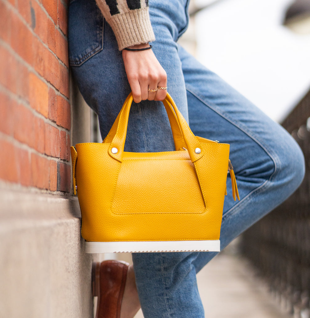 Off white top yellow bag